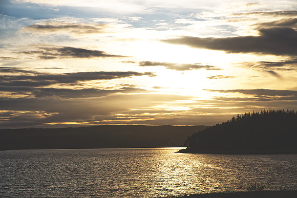 Moody Sunset Over Water.